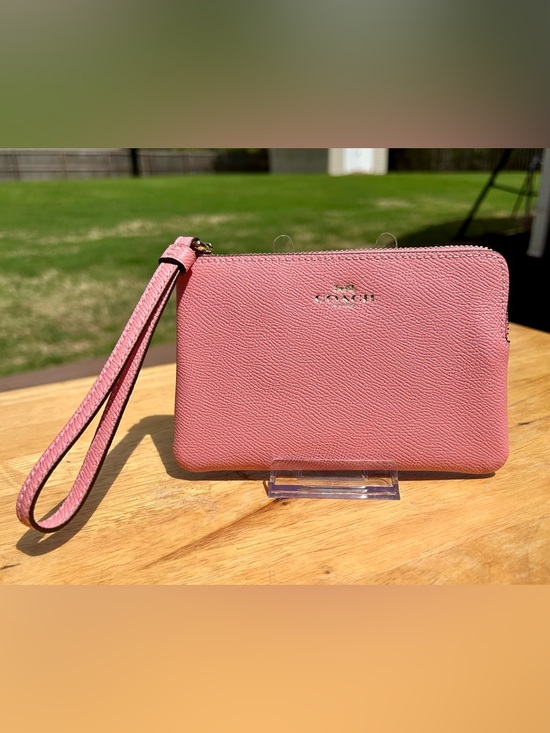 Coach Handbags - Coach Bubblegum Pink Leather Wristlet Corner Zip NWT